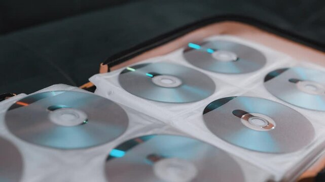 Close up of cd discs in a holder. Disc with data,movie or music.
