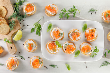 canape with cream and smoked salmon