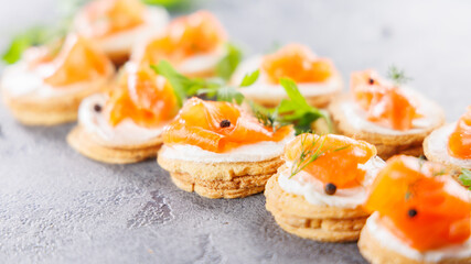 Festive canape with cream and smoked salmon