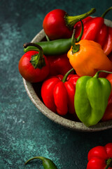 Colorful peper on green background