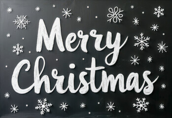 white chalk inscription on a black chalkboard, merry Christmas