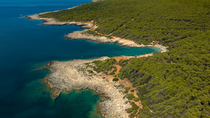 Aerial view of the beach in the Porto Selvaggio Regional Natural Park in Salento. It is a protected natural area of ​​Puglia located in the province of Lecce, Italy.