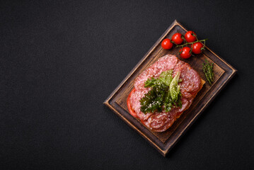 Focaccia with salami, cheese, tomatoes, arugula, salt, spices and herbs