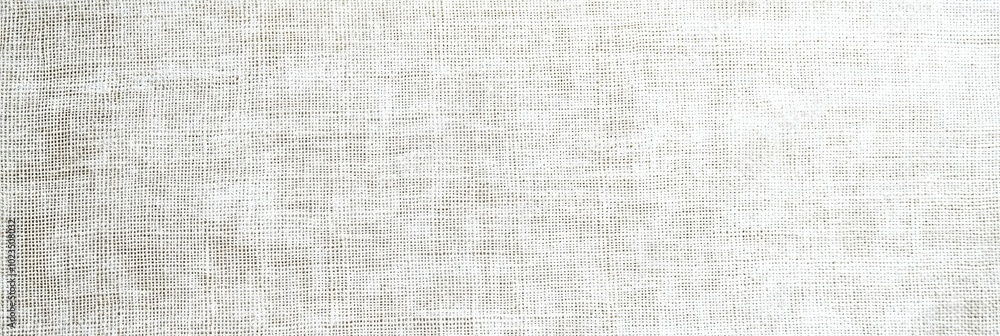 Poster a textured light fabric serves as an elegant backdrop, perfect for showcasing design work, fashion i