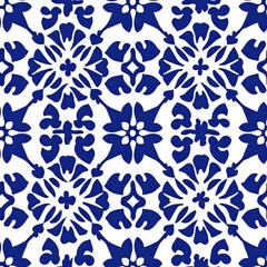 Fototapeta premium The design features a striking blue floral pattern on a white backdrop, with detailed shapes arranged symmetrically, perfect for textiles or wall decor