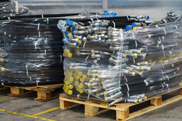 High pressure hoses packed in film and ready for shipment. High pressure hose pallets.