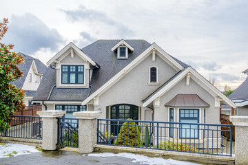 luxury house with big tree and nice landscape at winter in Vancouver, Canada