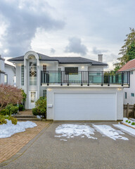 luxury house with big tree and nice landscape at winter in Vancouver, Canada