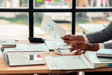 Meeting with accounting fund managers to plan quality improvement, consulting with the team, analyzing the stock market, investing, checking documents, checking accounts, close-up pictures.