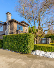 luxury house with big tree and nice landscape at winter in Vancouver, Canada