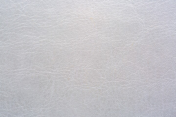Obraz premium Synthetic leather in brown macro, brown synthetic leather background, gray background with leather texture