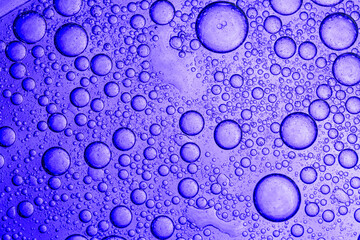 Blue Macro Drink Bubbles,fluid shapes in blue abstract background,Bubbles of oxygen in water. Water structure. Blue abstract water bubbles texture background