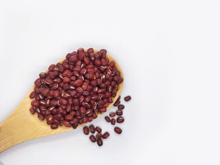red beans in a wooden spoon