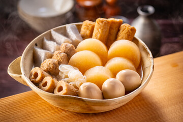 Japanese Oden, fish cake and vegetable stew.
Oden is a stew made with boiled eggs, radish (daikon), fish cakes and stock (dashi).