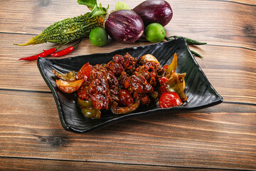 Asian cuisine - pork with chili sauce