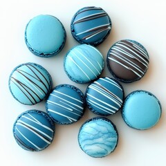 Obraz premium Delicious blue macarons with intricate designs, perfect for dessert lovers.