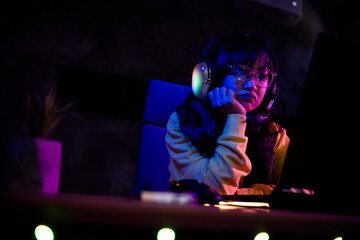 Photo of gamer lovely young lady lose upset boring play strategy game gamer laptop late night room indoors © deagreez