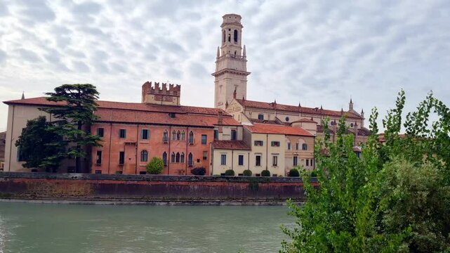 Verona - Italy - View over the river Adige to the bank with tower of the cathedral complex