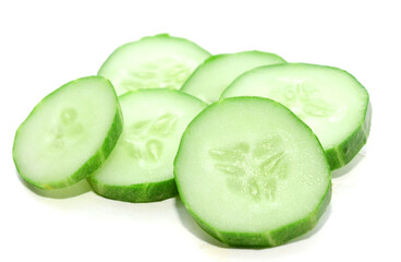 There are cucumbers on a white background - stock photo
