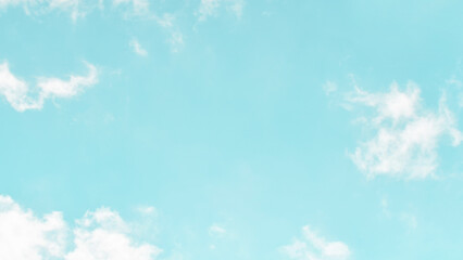 Blue pastel sky with white fluffy cloud. Cumulus clouds background. Cloudscape morning sky. The concepts of freedom of life, never give up and positive though energy.	
