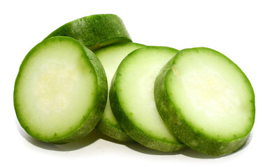 Studio shot of halved cucumber on white background - stock photo
