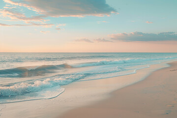 Obraz premium The ocean is calm and the sky is a beautiful shade of blue