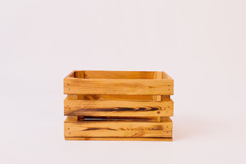 Closeup of a wooden crate on a white background