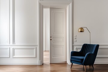 A blue chair sits in front of a white door