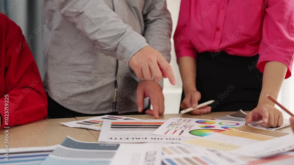 Poster hand closeup of designer team brainstorming and choosing color for graphic design working or client 