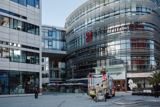 Fire trucks and emergency responders are seen in action in front of Breuninger D&uuml;sseldorf, Germany. 