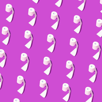 Pattern of toilet paper rolls on a purple background