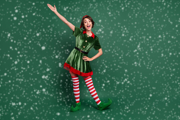 Full length body size view of attractive cheerful funny girl elf having fun celebratory isolated...
