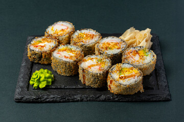 sushi on a black plate © arman