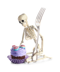 Delicious Halloween cupcake with candies and skeleton on white background