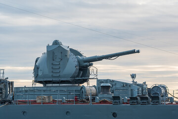 naval military background, concept, fragment of a modern warship with a gun turret