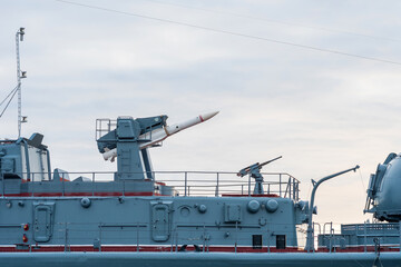 naval military background, concept, fragment of a modern warship with a rocket turret
