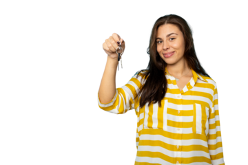 Latina holding apartment keys with a joyful expression