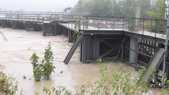 an urban dam to hold the river level during floodi