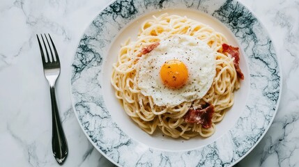 Creamy Pasta with Egg Yolk and Bacon Garnish