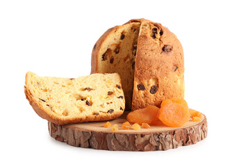 Wooden board with cut Panettone, dried apricots and raisins on white background