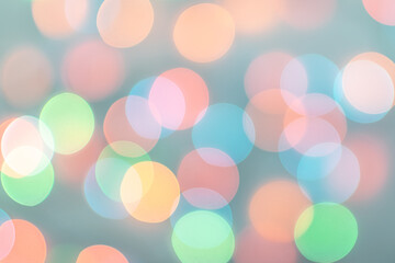 Colorful bokeh light on dark background.Festive New Years and Christmas background.
