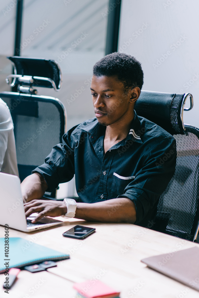 Aufkleber group of male entrepreneurs working together with laptops in comfortable office while sitting at des