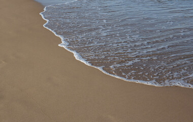 waves on the sand