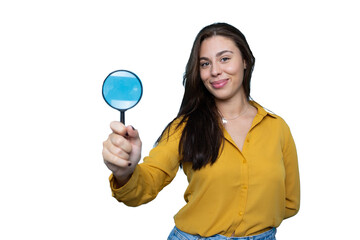 Portrait of a young businesswoman holding a magnifying glass