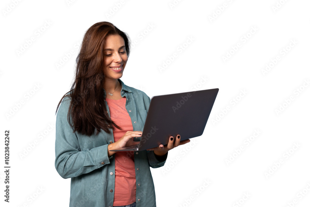 Wall mural Smiling girl holding a laptop in her hands