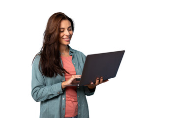 Smiling girl holding a laptop in her hands