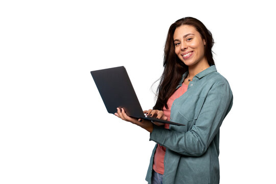Portrait of a young woman holding a laptop in her hands