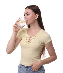 Woman drinking water with lemon on white background