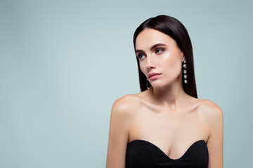 Fototapeta premium Photo of pretty attractive girl actress look profile side empty space wear black gown isolated grey color background