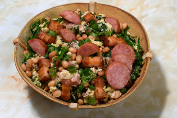TROPEIRO BEANS, A TRADITIONAL DISH OF BRAZILIAN CUISINE FROM THE STATE OF MINAS GERAIS